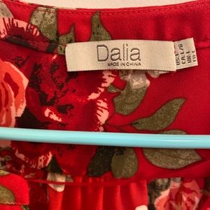 Floral red sleeveless blouse